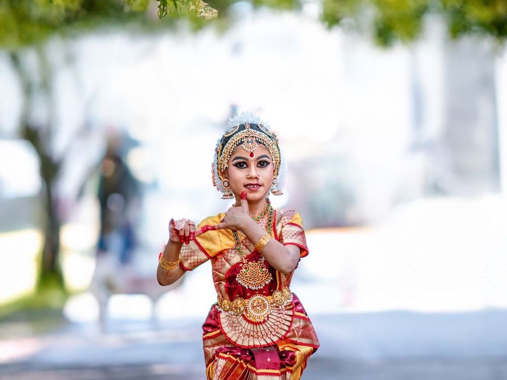 A student performing a classical Indian dance